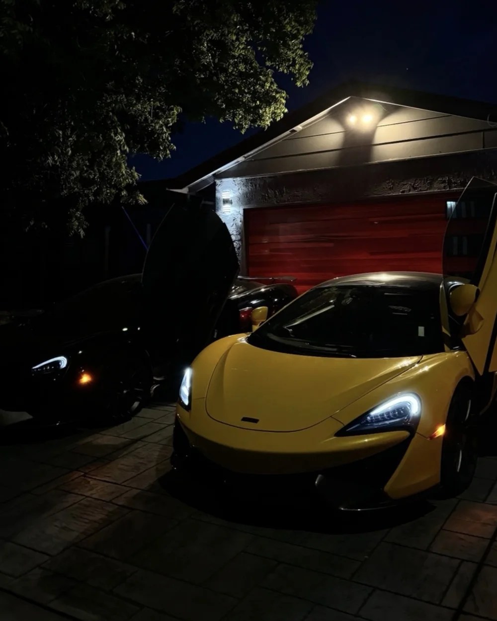 Yellow McLaren at night